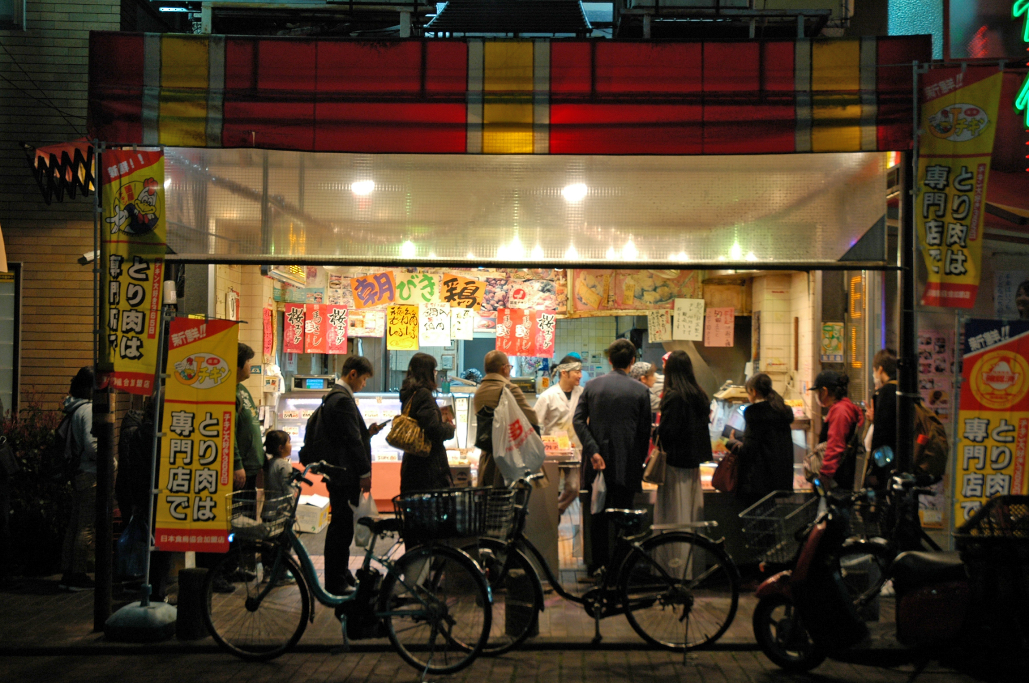 Dusk falls and the queues at Toridai, Jujo Ginza, begin. | REBECCA SAUNDERS