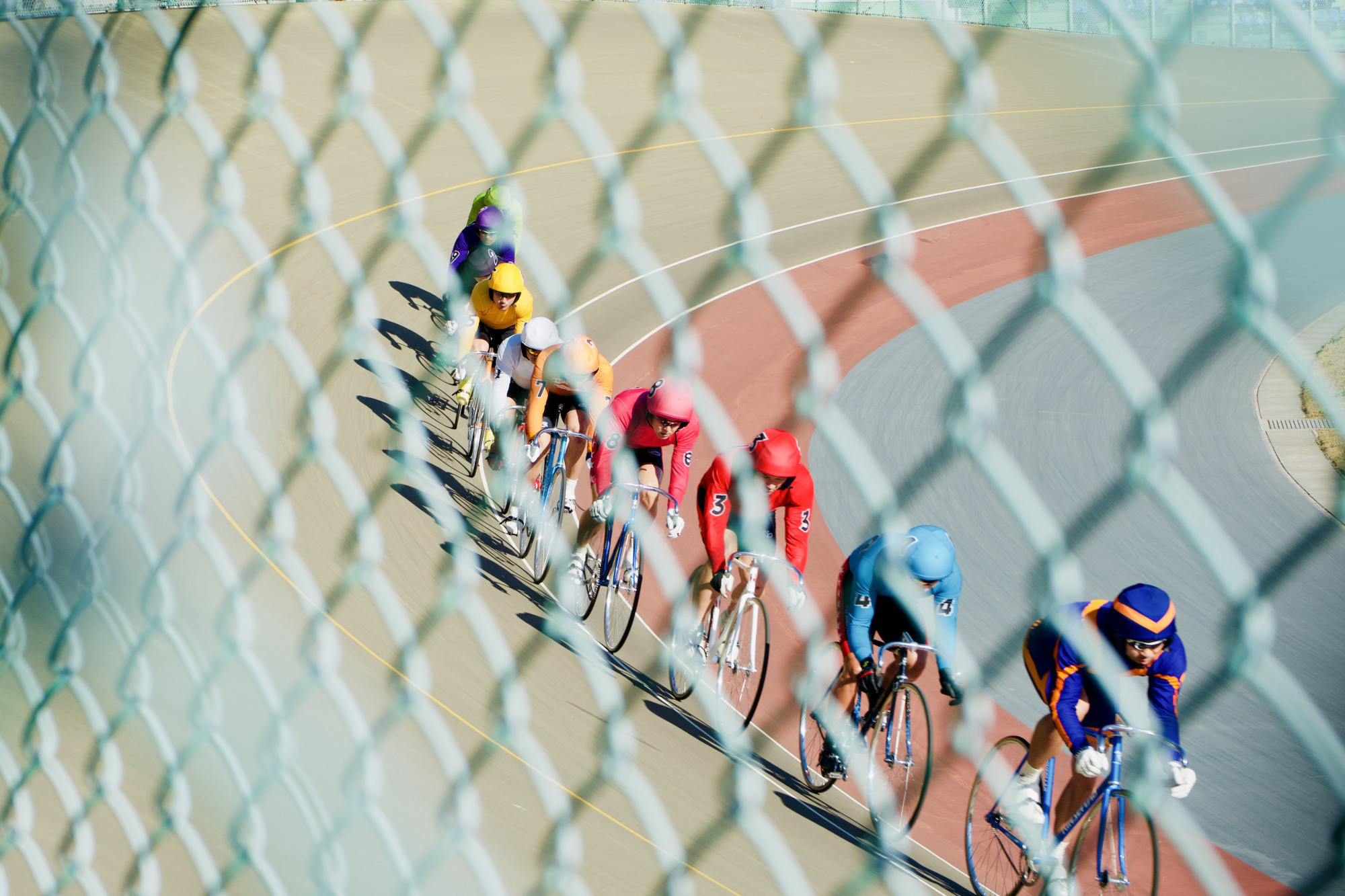 Easing into it: A pacemaker brings the line of keirin racers up to speed. | OSCAR BOYD