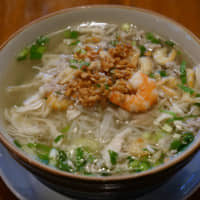Consistently delicious: Angkor Wat\'s popular pho noodles are made with a mixed pork-and-chicken broth, topped with fried garlic and shrimp. | CHISATO TANAKA