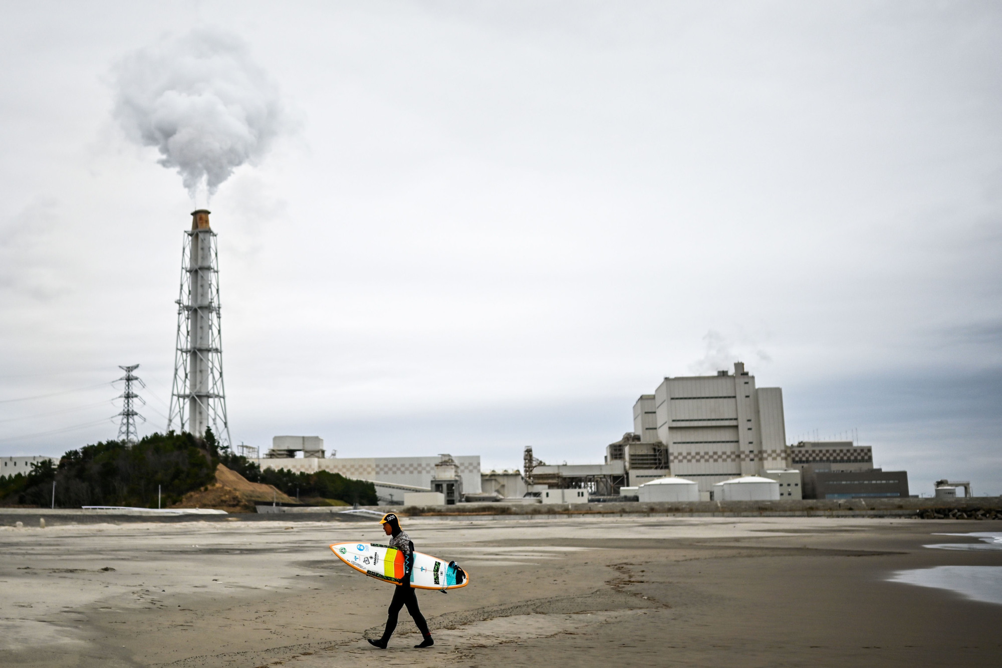 Emissions are released from a coal-fired power station in Minamisoma, Fukushima Prefecture, on March 4. Coal currently provides some 30 percent of the nation's power supply. | AFP-JIJI