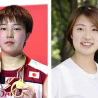 Badminton players Akane Yamaguchi (left) and Nozomi Okuhara have qualified for the 2020 Tokyo Olympics. | KYODO