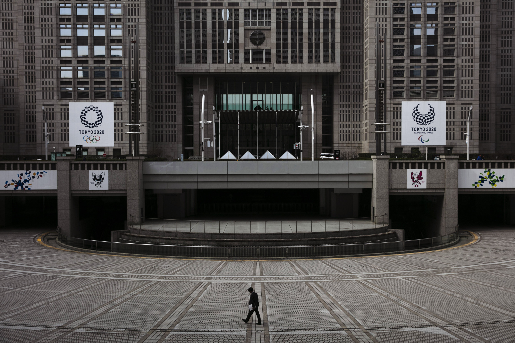 A man walks in front of the Tokyo Metropolitan Government building on Feb. 25. | AP