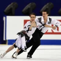Ice dancers Chris and Cathy Reed compete at the 2015 World Figure Skating Championships in Shanghai. Chris Reed died of a heart attack last weekend at age 30. | AFP-JIJI