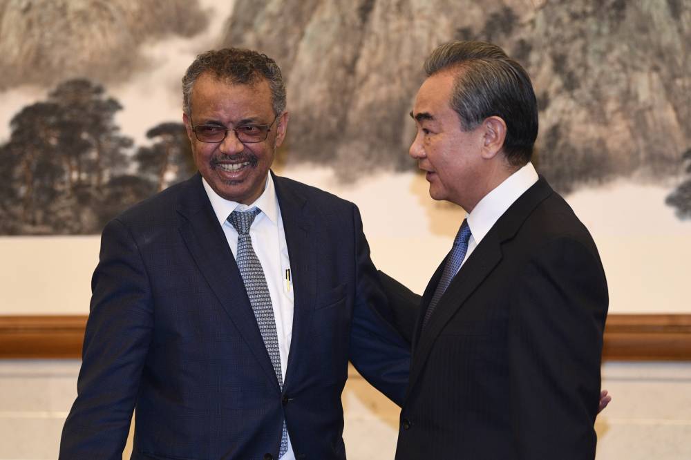 WHO Director General Tedros Adhanom attends a meeting with Chinese Foreign Minister Wang Yi in Beijing on Jan. 28 | SYUYA AOKI