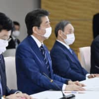 Prime Minister Abe addresses the government\'s coronavirus task force on Wednesday. | KYODO