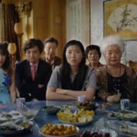Family values: Aoi Mizuhara (second from left) plays a Japanese woman who takes part in a fake wedding to help her Chinese fiance\'s family in \"The Farewell.\" | © 2019 BIG BEACH, LLC. ALL RIGHTS RESERVED
