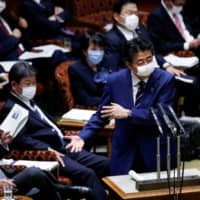 Prime Minister Shinzo Abe  speaks during an Upper House session on Tuesday. | REUTERS