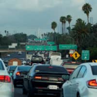 Morning traffic makes its way along a Los Angeles freeway in 2019. | REUTERS