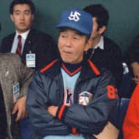 Swallows manager Junzo Sekine sits in the dugout at Tokyo Dome in April of 1988. | KYODO