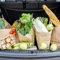 Drive-through: With prior reservation, Food Supply staff will load your trunk with ¥5,000 worth of rice, fruit and vegetables. | GETTY IMAGES