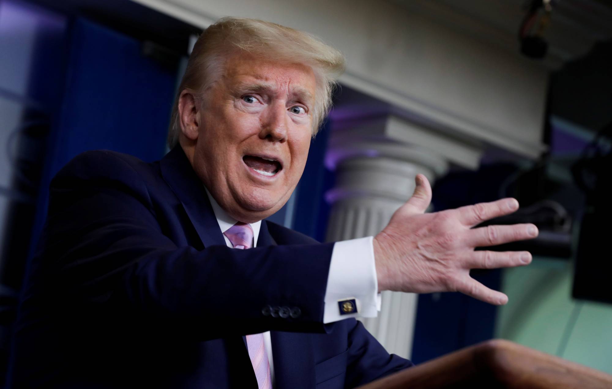 U.S. President Donald Trump answers a question from a reporter about hospitals and front-line health care workers reporting shortages of masks and coronavirus tests during the coronavirus response daily briefing at the White House in Washington on Friday. | REUTERS