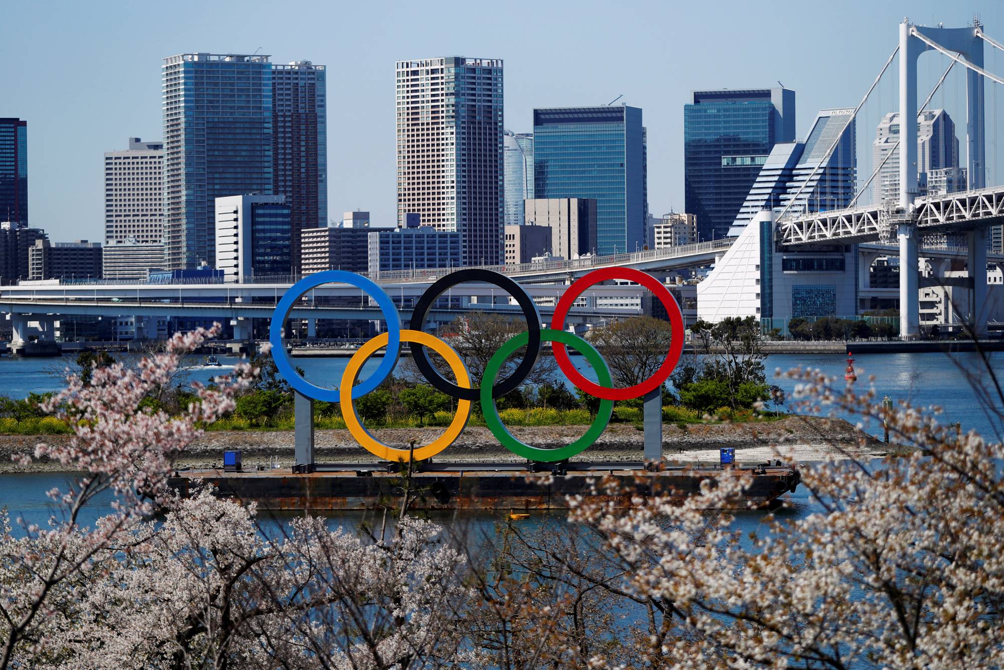 Rings of uncertainty: Olympic rings sit at Odaiba Marine Park in Tokyo on March 25, one day after the announcement of the games’ postponement due to the outbreak of the new coronavirus. | REUTERS