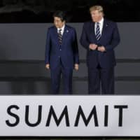 When the crisis abates, the U.S. and Japan must create a future mechanism to prevent pandemic challenges, especially in the absence of a credible global framework. | POOL / VIA BLOOMBERG
