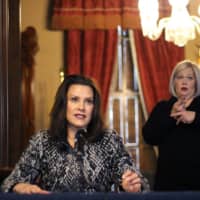 Michigan Gov. Gretchen Whitmer addresses the state during a speech in Lansing on Monday.  | MICHIGAN OFFICE OF THE GOVERNOR / VIA AP