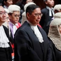 Judges of the Court of Final Appeal: (From left) Andrew Cheung Kui-nung, Robert Ribeiro and Secretary of Justice Teresa Cheng. | REUTERS