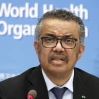 WHO chief Tedros Adhanom Ghebreyesus addresses a news conference about COVID-19. | KEYSTONE / VIA AP