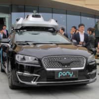 An autonomous vehicle operated by self-driving car startup Pony.ai is seen during a government-organized tour to the Guangdong-Hong Kong-Macao Greater Bay Area, in Guangzhou, China, in February 2019. |  REUTERS