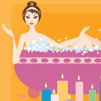 Crack out the candles: Lean into a good night\'s sleep by treating yourself to a bubble bath with candles. | GETTY IMAGES