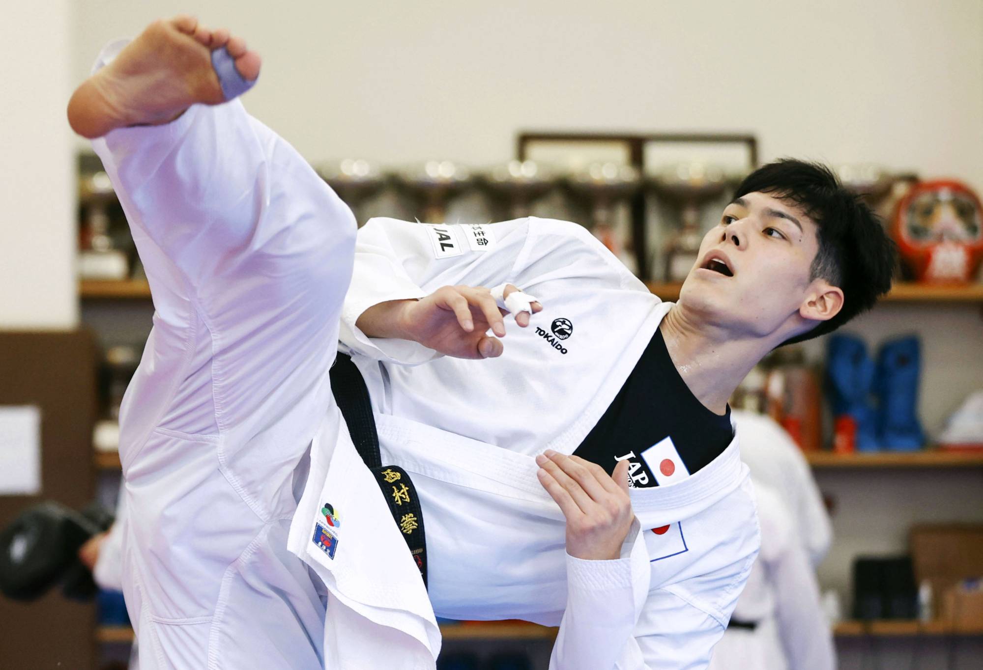 Karateka Ken Nishimura trains at Kindai University in Higashiosaka, Osaka Prefecture, in February. | KYODO