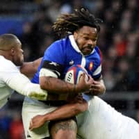 France\'s Mathieu Bastareaud runs with the ball during a Six Nations match between France and England on Feb. 10, 2019, at Twickenham Stadium in London. | REUTERS