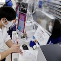 Sales at convenience stores in Japan fell 5.8 percent in March from a year earlier amid coronavirus crisis.  | KYODO
