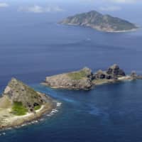 Foreign Minister Toshimitsu Motegi has protested a move by China to set a route for its government-operated ships that passed near the Senkaku Islands in the East China Sea. | KYODO
