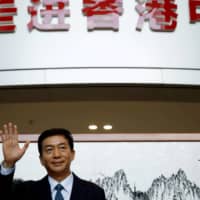 Luo Huining, head of China\'s Hong Kong Liaison Office, speaks to media to mark his first day in the post in Hong Kong on Jan. 6. | REUTERS 