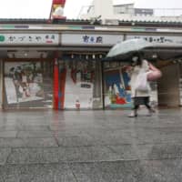 Most stores are closed in the Asakusa tourist district of Tokyo last Saturday, under a state of emergency declared due to the COVID-19 pandemic. | KYODO
