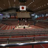 The Spring Grand Sumo Tournament took place without fans at Edion Arena Osaka in March. | REUTERS