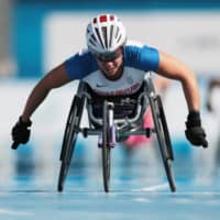 Britain\'s Hannah Cockroft races in the women\'s 800m T34 final during the 2019 World Para Athletics Championships on Nov. 14, 2019, in Dubai. | REUTERS