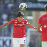 VfB Stuttgart midfielder Wataru Endo warms up during a German second-division match on Aug. 24 in Aue, Germany. | KYODO
