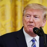 U.S. President Donald Trump speaks in the East Room of the White House on Tuesday.  | AFP-JIJI