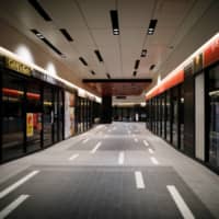 A shopping and entertainment complex is almost fully closed in the Kabukicho district of Tokyo, after the government announced a state of emergency as the new coronavirus spread in the country, on April 13, 2020. | REUTERS