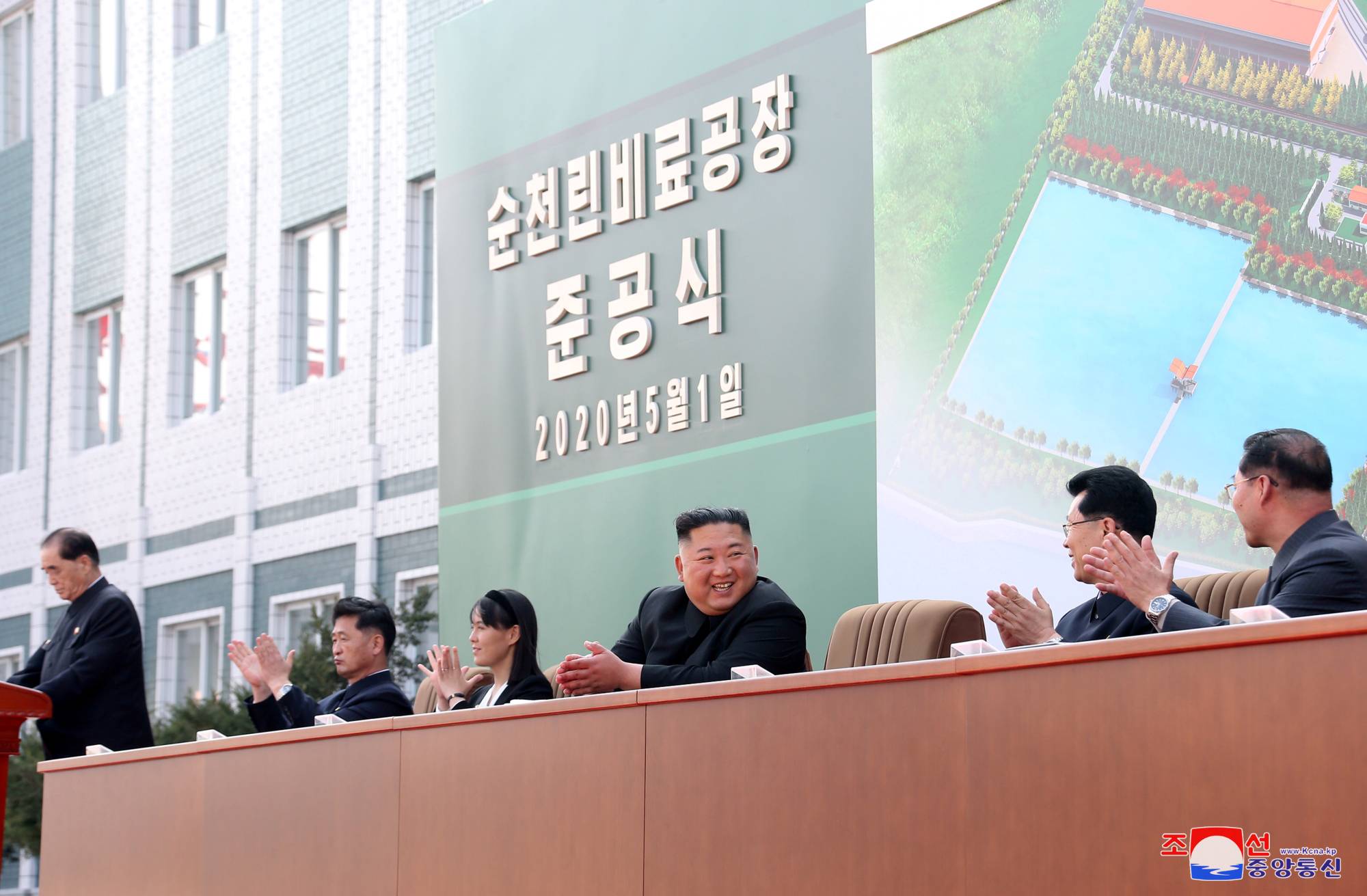 North Korean leader Kim Jong Un attends the completion of a fertilizer plant, together with his younger sister Kim Yo Jong, north of Pyongyang, in an image released Saturday. | KCNA / VIA REUTERS