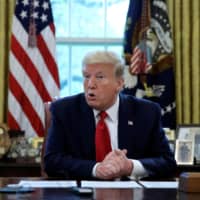 U.S. President Donald Trump speaks during an interview at the White House on Friday.  | REUTERS 