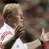 Ronald Koeman, then coach of Benfica, reacts during a friendly against Juventus on Aug. 6, 2005, in Lisbon. The 57-year-old, who is currently head coach of the Dutch national team, underwent a heart procedure on Sunday. | AP