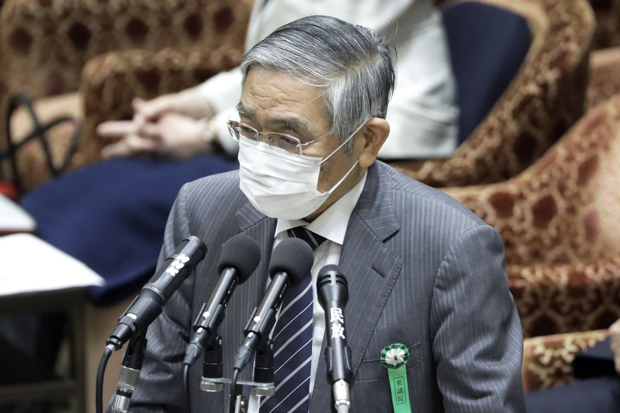 Bank of Japan Gov. Haruhiko Kuroda speaks during a session of the Lower House Budget Committee on April 28. | BLOOMBERG