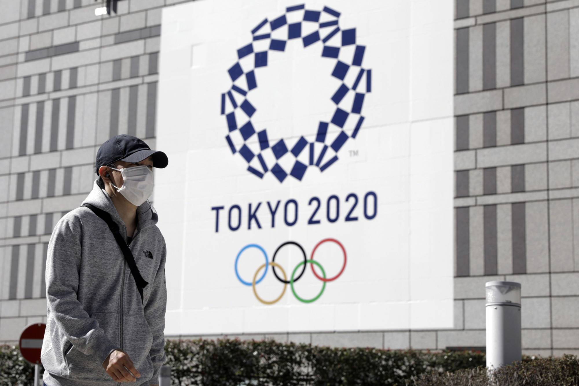 The possibility of the Tokyo Olympics’ cancellation and the economic fallout created by the pandemic, coupled with the public’s disapproval of Prime Minister Shinzo Abe’s coronavirus response, could deal a blow to the prime minister’s legacy. | BLOOMBERG