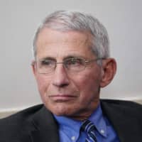 National Institute of Allergy and Infectious Diseases Director Anthony Fauci listens during a briefing on the novel coronavirus at the White House on April 6. | AFP-JIJI