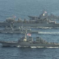 U.S. Navy and British Royal Navy ships conduct joint operations in the Barents Sea to ensure maritime security in the Arctic Ocean on May 5. | BRITISH ROYAL NAVY