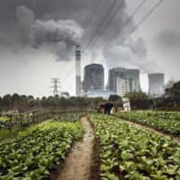 In a bid to boost economies crippled by the coronavirus pandemic, analysts say policymakers in Asia are pushing the construction of coal-fired power plants. | BLOOMBERG