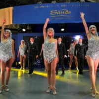 Dancers perform at the Las Vegas Sands Corp. booth at the Japan IR Expo in Yokohama in January. | REUTERS