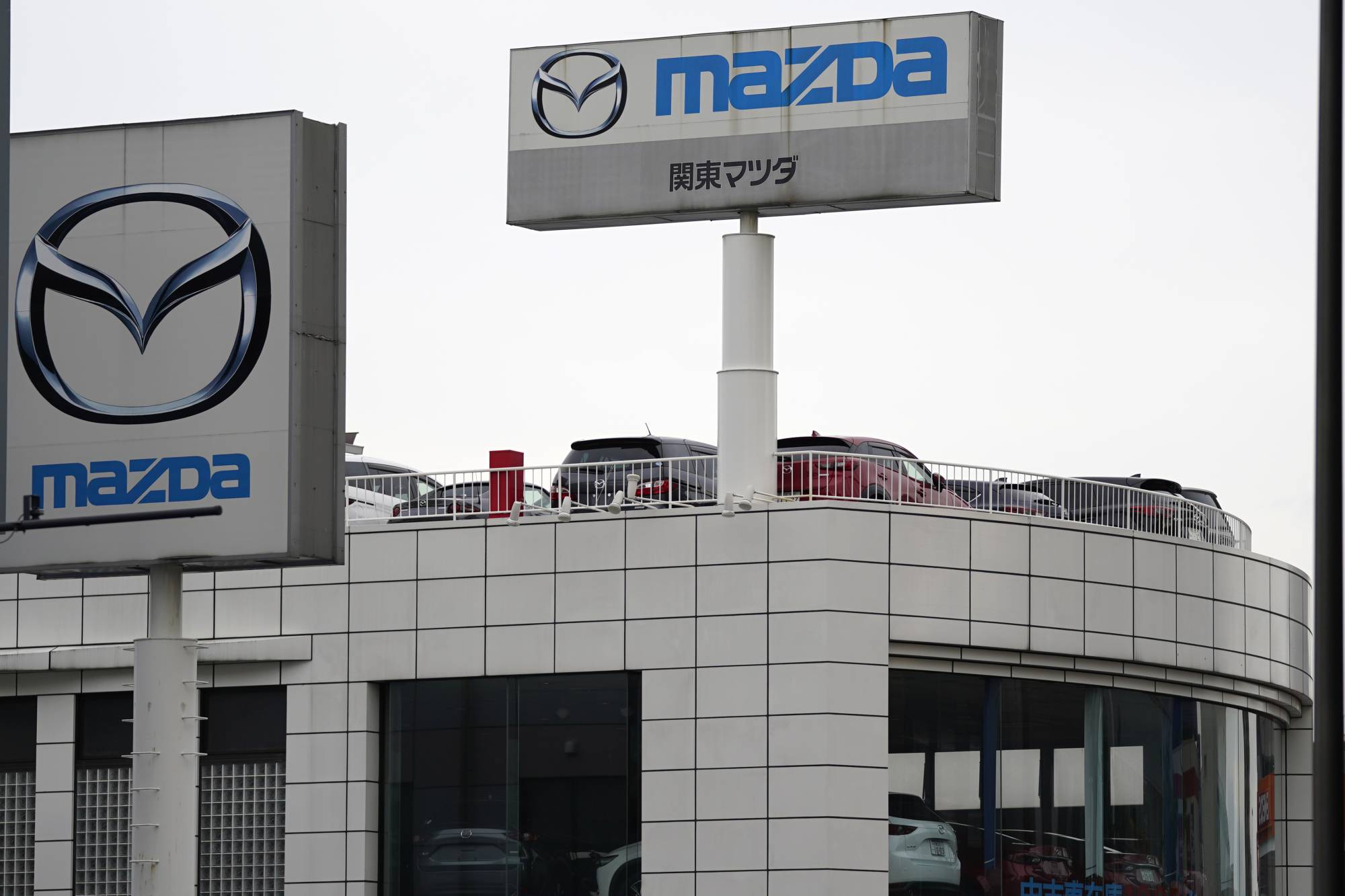A Mazda Motor Corp. dealership in Tokyo on Sunday | BLOOMBERG