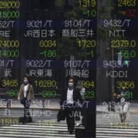 Under new rules taking effect June 7, any overseas investor who wants to build a stake in a firm of more than 1 percent needs to notify regulators, a severe tightening from the previous 10 percent. | AFP-JIJI