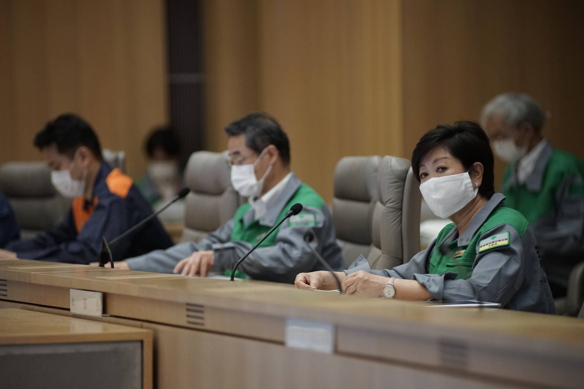 Tokyo Gov. Yuriko Koike looks on during a meeting of the city's coronavirus task force on Friday.  | RYUSEI TAKAHASHI