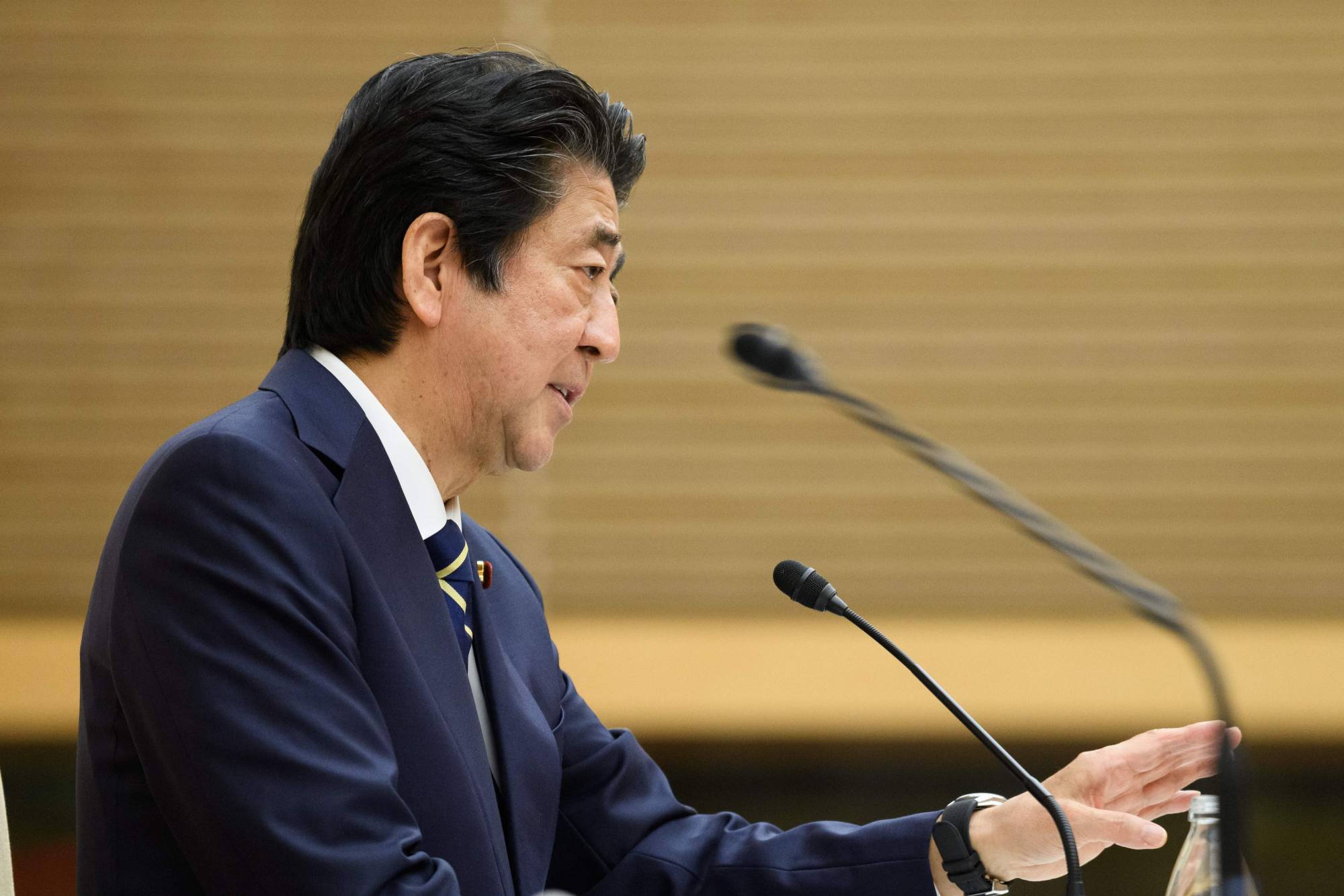 Prime Minister Shinzo Abe speaks during a news conference at the Prime Minister's Office in Tokyo on Thursday. Abe said the following day that Japan will call for an investigation into the World Health Organization's initial response to the coronavirus pandemic. | POOL / VIA AFP-JIJI