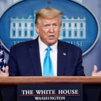 U.S. President Donald Trump addresses the daily coronavirus task force briefing at the White House in Washington on April 7. | REUTERS