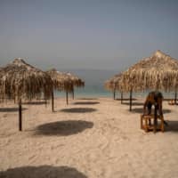 A beach near Athens on Friday, a day before it officially opened to the public. | AFP-JIJI