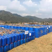 Precursor chemicals used to make illicit drugs such as methamphetamine, ketamine, heroin and fentanyl seized by Myanmar police and military are seen in this undated photo near Loikan village in Shan State between February and April 2020 in what the United Nations Office on Drugs and Crime described as Asia\'s biggest-ever drug bust.  | MYANMAR POLICE / UNODC / VIA REUTERS