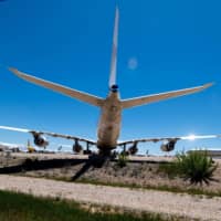 Planes at a commercial aircraft maintenance, repair and overhaul center at Teruel Airport in Teruel, Spain, on Monday | AFP-JIJI